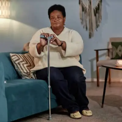 Person sitting on a couch.